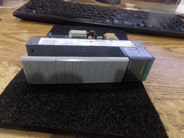 Allen Bradley Cat. #: 1746-NIO4V Analog Combination I/O Module. Series: A