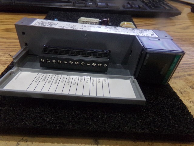Allen Bradley Cat. #: 1746-NIO4V Analog Combination I/O Module. Series: A