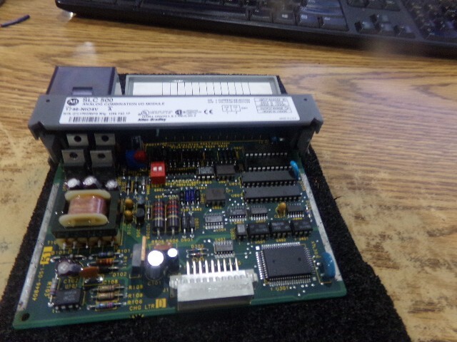 Allen Bradley Cat. #: 1746-NIO4V Analog Combination I/O Module. Series: A